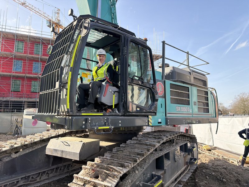 Dasos Christou rides in digger (Winwood)